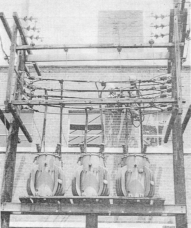 Figure 4-9.Three-phase 25 kVA transformers mounted on an H-frame platform
