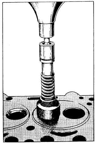 Grinding valve seats using a concentric type of grinder